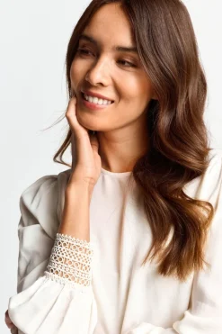 Bluse Mit Manschetten Aus Spitze